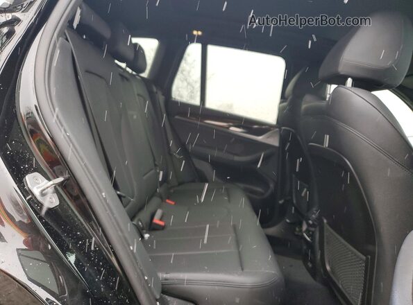 5UXTY3C01L9B89987 2020 BMW X3 Black Widok wnętrza z tyłu