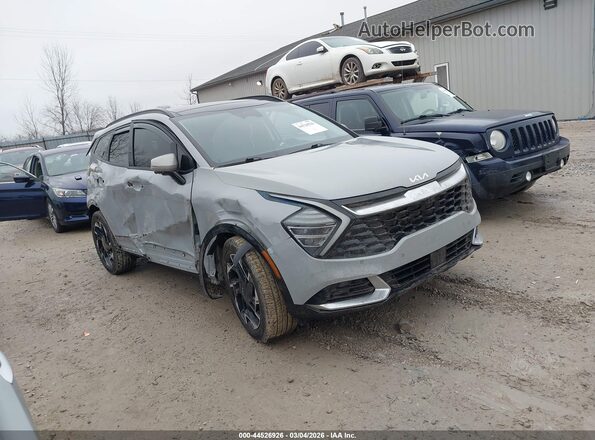 5XYK5CAFXPG004107 2023 KIA SPORTAGE Серый Вид задней части салона