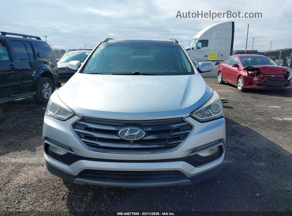 5XYZUDLB7JG506209 2018 HYUNDAI SANTA FE SPORT Серебряный Вид задней части салона