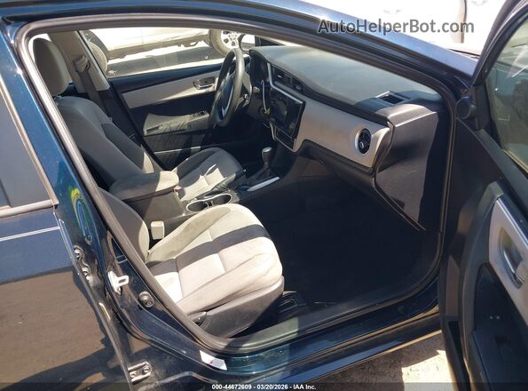5YFBURHE4JP778522 2018 TOYOTA LL Синий Вид салона спереди