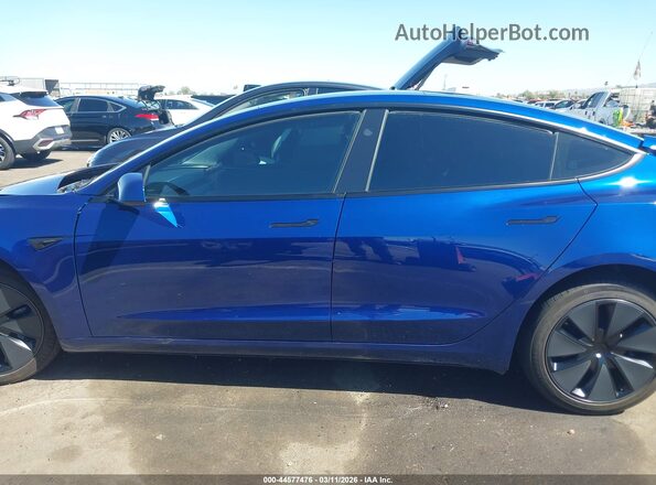 5YJ3E1EA1SF041599 2025 TESLA MODEL 3 Blue Widok wnętrza z tyłu