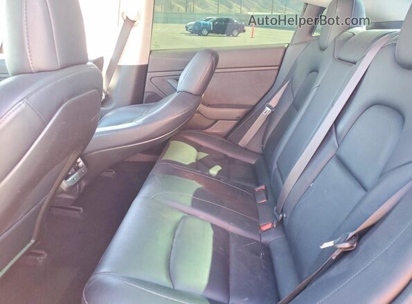 5YJ3E1EB5JF070689 2018 TESLA MODEL Silver Vista de los asientos traseros