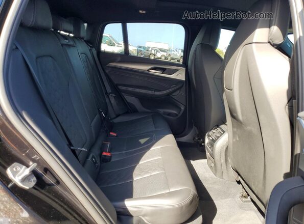 5YMUJ0C0XLLU67219 2020 BMW X4 Black Widok wnętrza z tyłu