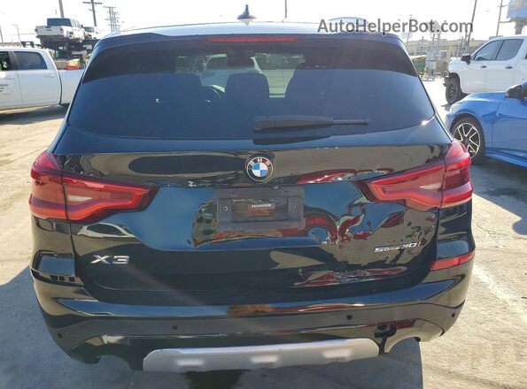 5UXTY3C05L9B40016 2020 BMW X3 Черный Вид салона спереди