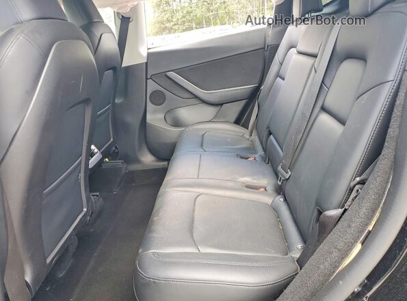 7SAYGDEE1NA007462 2022 TESLA MODEL Black Vista interior trasera