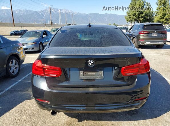 WBA8E1G57JNU89851 2018 BMW OTHER Black Widok wnętrza z przodu