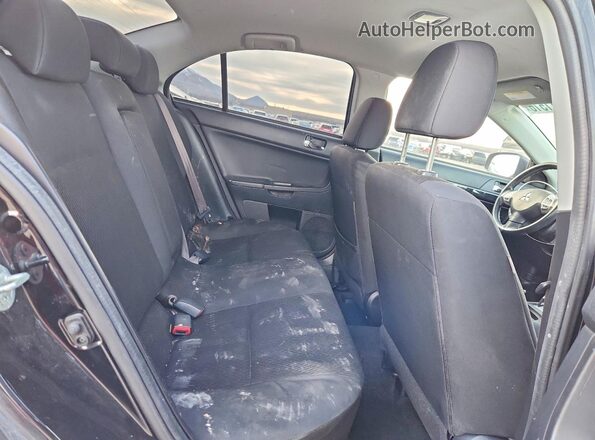 JA32U2FU5GU007868 2016 MITSUBISHI LANCER Черный Вид задней части салона