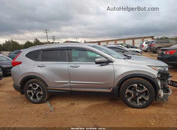 7FARW1H90HE034827 2017 HONDA CR-V Серебряный Вид задней части салона