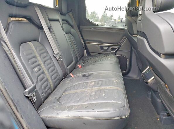 7FCTGAAA6NN011272 2022 RIVIAN R1T Blue Vista de los asientos traseros