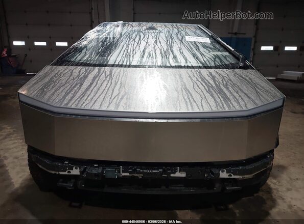 7G2CEHED0RA034862 2024 TESLA CYBERTRUCK Tan Սալոնի հետևի տեսք
