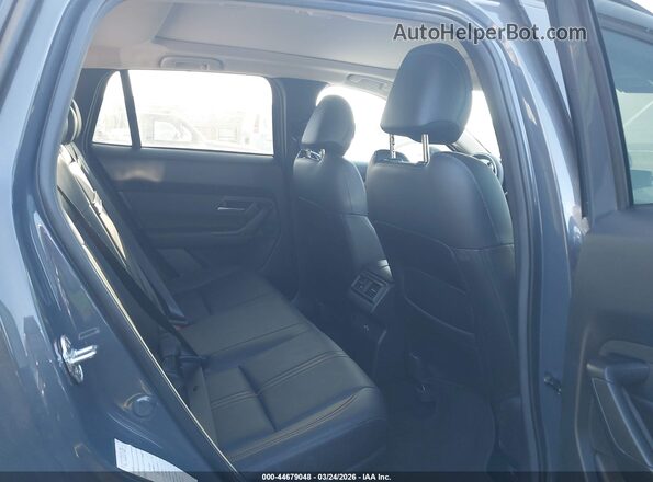 7MMVAADW7SN134680 2025 MAZDA CX-50 HYBRID Gray Vista de la etiqueta del VIN
