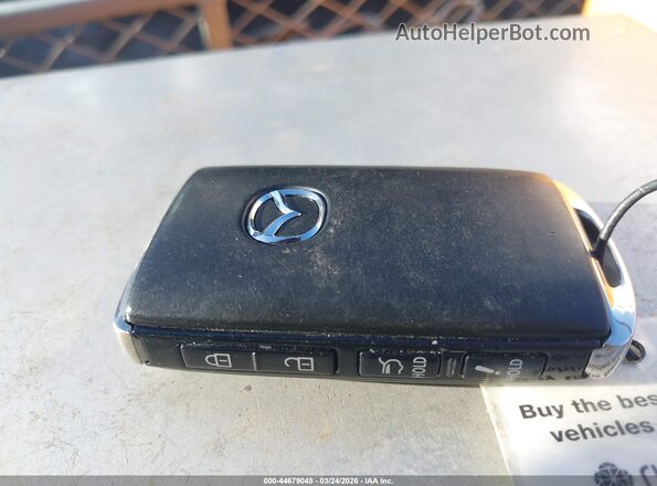7MMVAADW7SN134680 2025 MAZDA CX-50 HYBRID Gray Vista del salpicadero