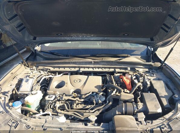 7MMVAADW7SN134680 2025 MAZDA CX-50 HYBRID Gray Vista trasera