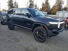 2024 Rivian R1s Adventure Черный vin: 7PDSGABA2RN035910