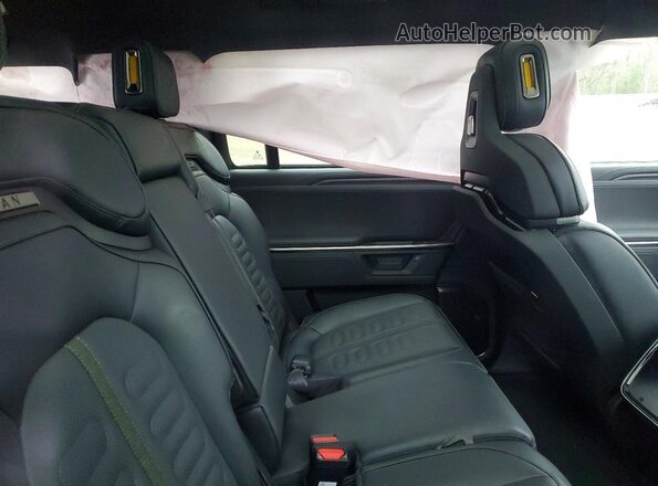 7PDSGBBA4SN073036 2025 RIVIAN R1S Gray Rear interior view