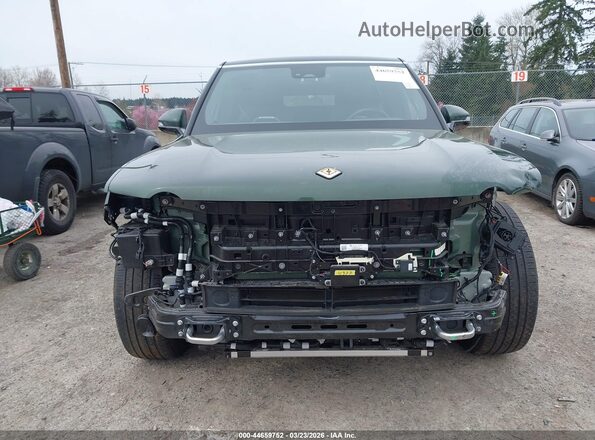 7PDSGCBA7RN030486 2024 RIVIAN R1S Green Vista interior trasera