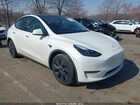2025 Tesla Model Y Long Range Dual Motor All-wheel Drive White vin: 7SAYGAEE1SF296372