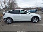 2022 Tesla Model Y Long Range Dual Motor All-wheel Drive White vin: 7SAYGAEE3NF544920