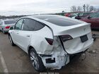 2022 Tesla Model Y Long Range Dual Motor All-wheel Drive White vin: 7SAYGAEE3NF544920