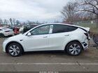 2022 Tesla Model Y Long Range Dual Motor All-wheel Drive White vin: 7SAYGAEE3NF544920