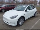 2022 Tesla Model Y Long Range Dual Motor All-wheel Drive White vin: 7SAYGAEE3NF544920