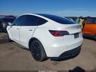 2022 Tesla Model Y Long Range Dual Motor All-wheel Drive White vin: 7SAYGAEE4NF351577