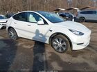 2022 Tesla Model Y Long Range Dual Motor All-wheel Drive White vin: 7SAYGAEE4NF516012
