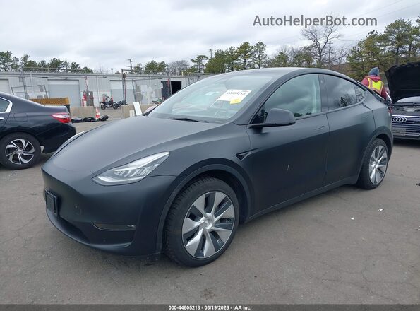 7SAYGAEE6NF389909 2022 TESLA MODEL Y Black წინა მარცხენა ხედი სამი მეოთხედიდან