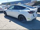 2023 Tesla Model Y Awd/long Range Dual Motor All-wheel Drive White vin: 7SAYGAEE7PF626832
