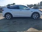 2023 Tesla Model Y Awd/long Range Dual Motor All-wheel Drive White vin: 7SAYGAEE8PF589211
