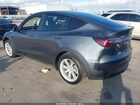2023 Tesla Model Y Rwd Gray vin: 7SAYGDED1PF956099
