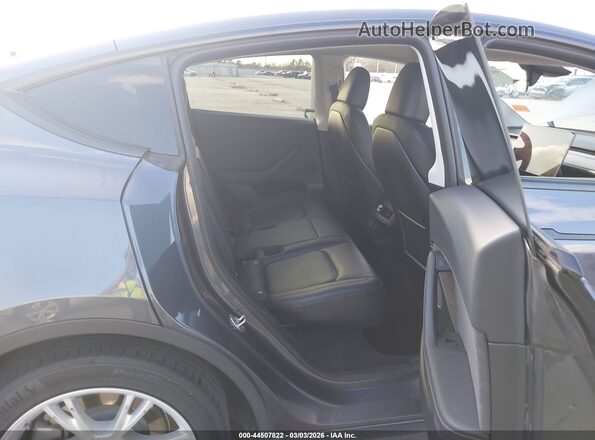 7SAYGDED1PF956099 2023 TESLA MODEL Y Gray Vista de la etiqueta del VIN