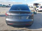 2023 Tesla Model Y Rwd Gray vin: 7SAYGDED1PF956099