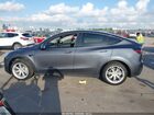 2023 Tesla Model Y Rwd Gray vin: 7SAYGDED1PF956099