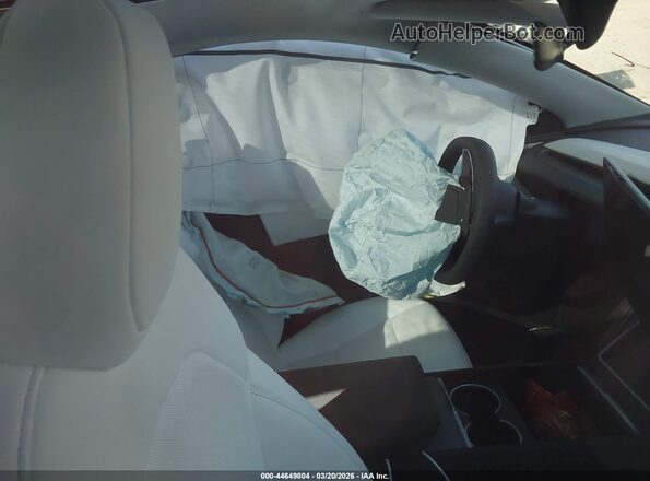 7SAYGDED1TF540354 2026 TESLA MODEL Y White Widok tylnych siedzeń