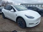 2024 Tesla Model Y Long Range Single Motor Rear-wheel Drive/rwd White vin: 7SAYGDED2RF129781