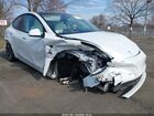 2024 Tesla Model Y Long Range Single Motor Rear-wheel Drive/rwd Белый vin: 7SAYGDED3RF158528