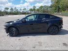 2025 Tesla Model Y Long Range Dual Motor Rear-wheel Drive Black vin: 7SAYGDED4SF246655