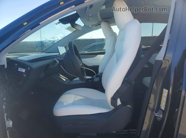 7SAYGDED4TA445672 2026 TESLA MODEL Gray Front interior view