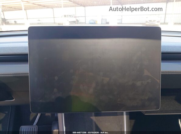 7SAYGDED5TF404728 2026 TESLA MODEL Y Gray Widok tylnych siedzeń