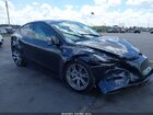 2024 Tesla Model Y Long Range Single Motor Rear-wheel Drive/rwd Gray vin: 7SAYGDED6RF023575