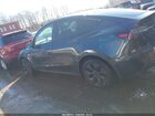 2025 Tesla Model Y Long Range Single Motor Rear-wheel Drive Gray vin: 7SAYGDED6SF318987