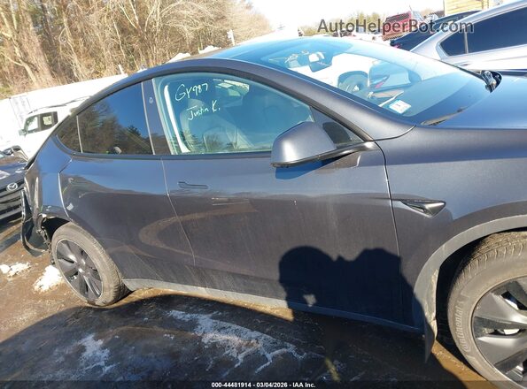7SAYGDED6SF318987 2025 TESLA MODEL Y Gray ხელსაწყოთა პანელის ხედი