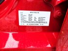 2026 Tesla Model Y Red vin: 7SAYGDED7TF439996