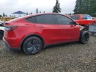 2026 Tesla Model Y Red vin: 7SAYGDED7TF439996