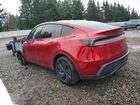 2026 Tesla Model Y Red vin: 7SAYGDED7TF439996