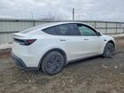 2026 Tesla Model Y White vin: 7SAYGDEDXTA412188