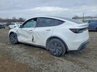 2026 Tesla Model Y White vin: 7SAYGDEDXTA412188