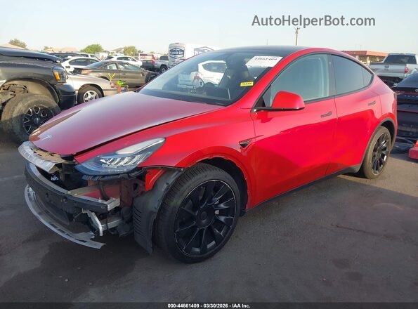 7SAYGDEE0NF385212 2022 TESLA MODEL Y Red წინა მარცხენა ხედი სამი მეოთხედიდან