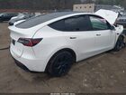 2024 Tesla Model Y Long Range Dual Motor All-wheel Drive White vin: 7SAYGDEE2RF152521
